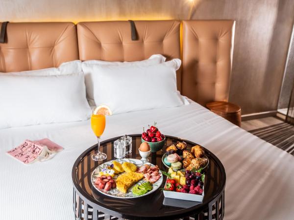 Milan Suite Hotel : photo 6 de la chambre suite junior avec jardin privé