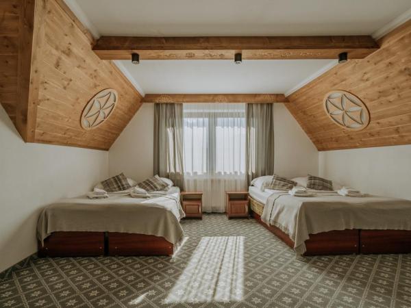 Willa Swoboda Garden Spa : photo 1 de la chambre chambre quadruple avec accès gratuit au spa
