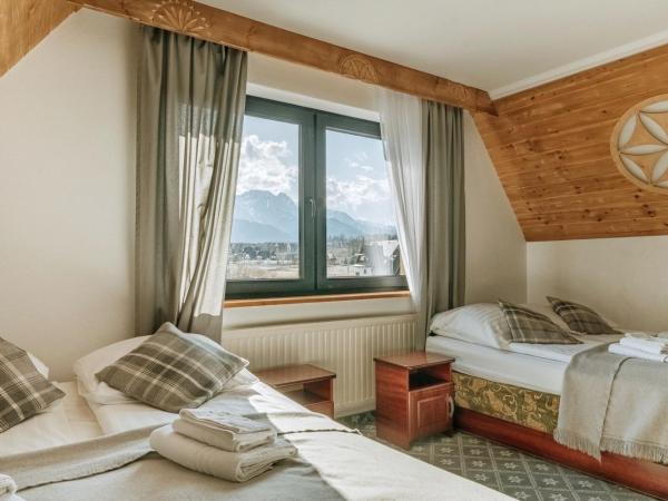 Willa Swoboda Garden Spa : photo 4 de la chambre chambre quadruple avec accès gratuit au spa