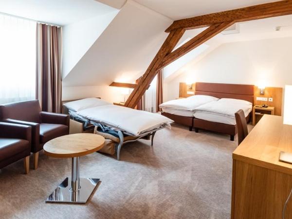 Central City Hotel Rochat : photo 9 de la chambre chambre triple