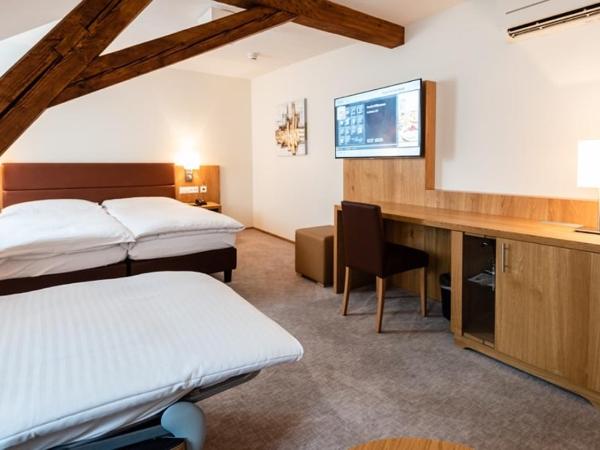 Central City Hotel Rochat : photo 7 de la chambre chambre triple