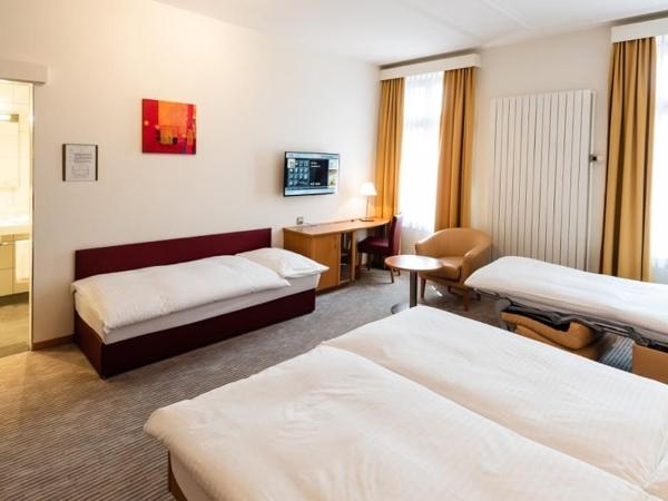 Central City Hotel Rochat : photo 8 de la chambre chambre familiale