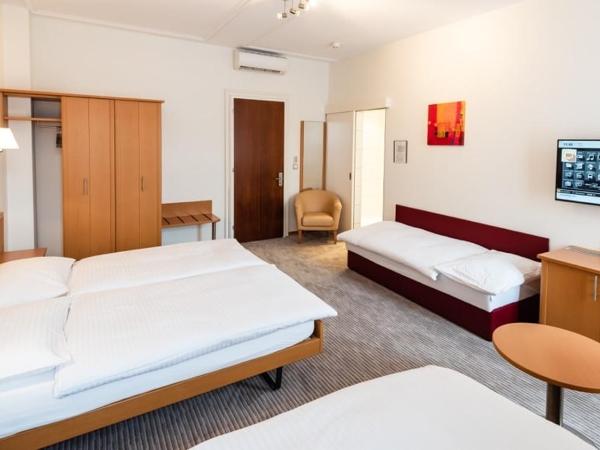 Central City Hotel Rochat : photo 9 de la chambre chambre familiale