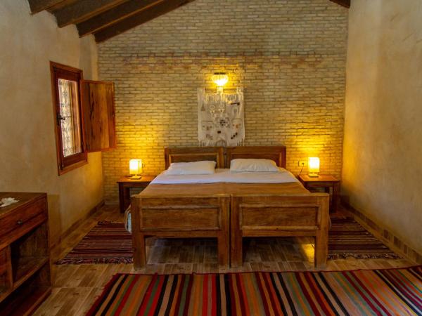 Dar Horchani Tozeur : photo 4 de la chambre chambre triple - vue sur jardin