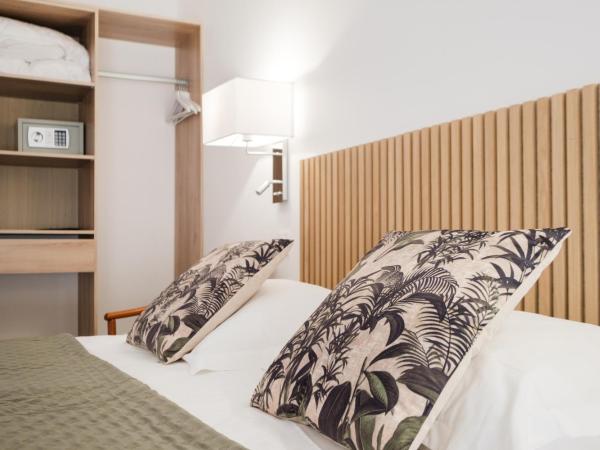 Anglade Hotel : photo 2 de la chambre chambre double ou lits jumeaux - côté village