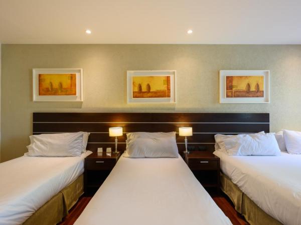 Orfeo Suites Cordoba : photo 3 de la chambre chambre quadruple