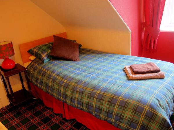 Atticus Central Guest House : photo 2 de la chambre chambre simple avec toilettes et douche communes