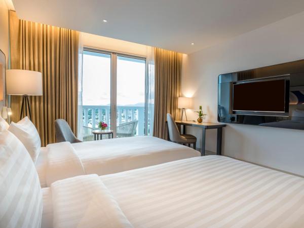 Novotel Phuket City Phokeethra : photo 3 de la chambre chambre lits jumeaux deluxe avec balcon