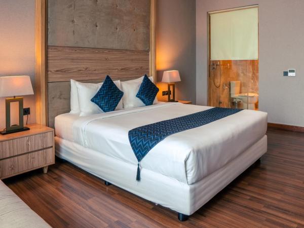 Azana Suites Hotel Antasari : photo 4 de la chambre grande chambre double 
