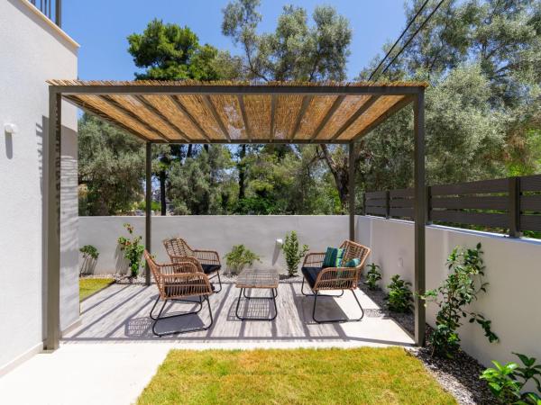 La Lucciola apartments : photo 10 de la chambre appartement 1 chambre avec jardin