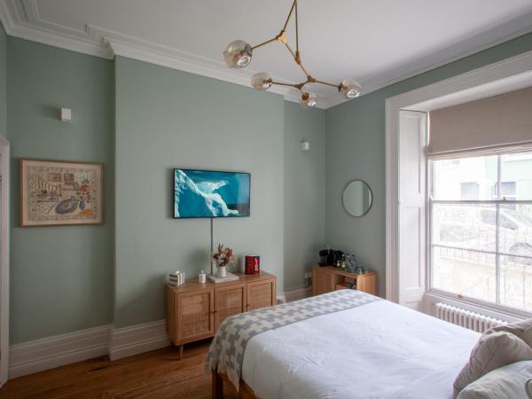 Lido Townhouse : photo 1 de la chambre chambre lit king-size