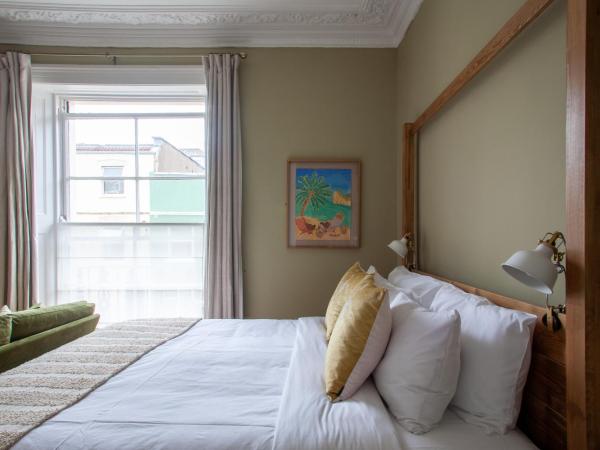 Lido Townhouse : photo 1 de la chambre chambre lit king-size supérieure