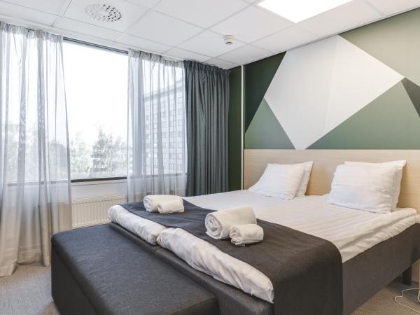 GreenStar Hotel Oulu : photo 5 de la chambre chambre lits jumeaux