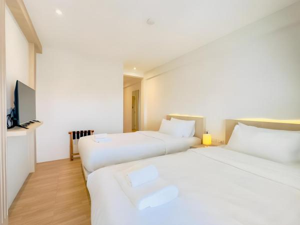 Zhennan Teabar Hotel : photo 3 de la chambre chambre lits jumeaux avec salle de bains privative