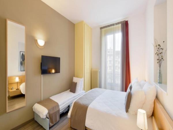 Hôtel du Marché : photo 3 de la chambre chambre triple avec salle de bains commune