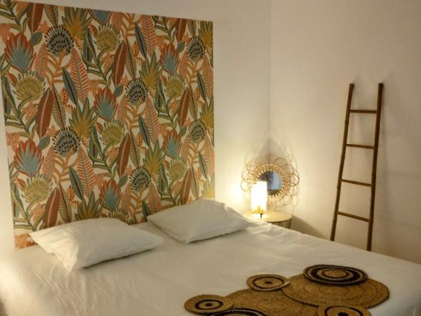 Maison d'Hôtes Floribel : photo 5 de la chambre appartement - vue sur jardin