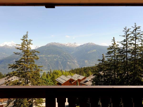 Hotel Helvetia Intergolf : photo 5 de la chambre suite familiale (2 adultes + 2 enfants) avec balcon - vue sur montagnes
