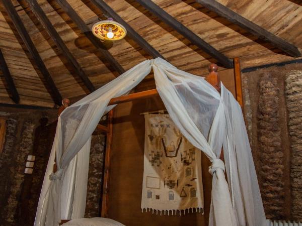 Dar Horchani Tozeur : photo 5 de la chambre chambre quadruple - vue sur jardin