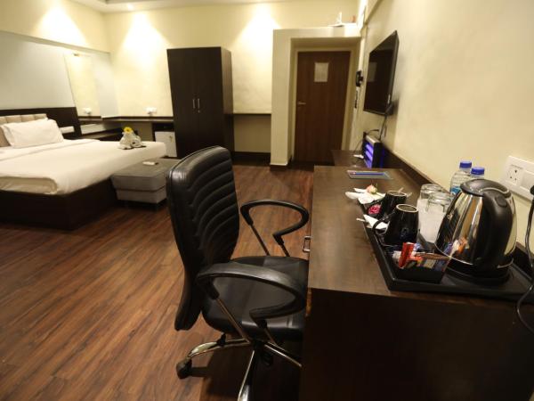 Sai Park Inn by UMRB - Mumbai Airport : photo 2 de la chambre suite deluxe avec lit king-size