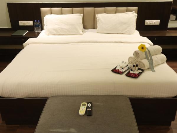 Sai Park Inn by UMRB - Mumbai Airport : photo 3 de la chambre suite deluxe avec lit king-size