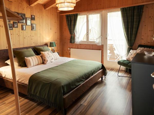 The Glen - GRINDELHOMES : photo 2 de la chambre the gable apartment