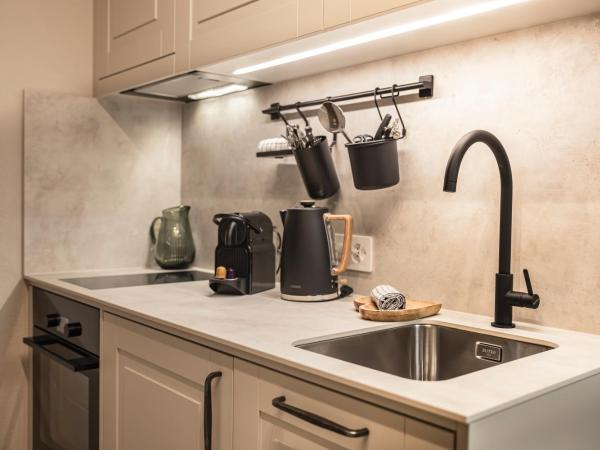 The Glen - GRINDELHOMES : photo 4 de la chambre the gigi apartment