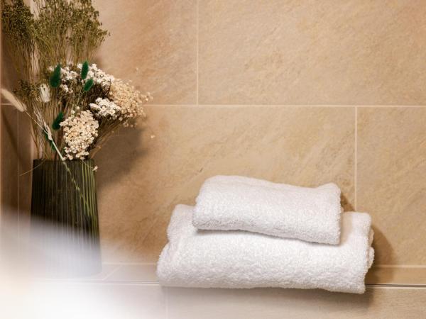 The Glen - GRINDELHOMES : photo 9 de la chambre the gigi apartment