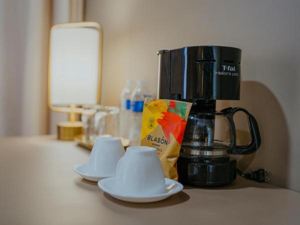 ArcoSodi Hotel Boutique : photo 10 de la chambre suite lit king-size avec baignoire spa