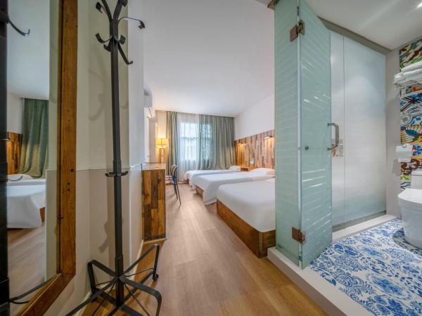 Sonderia Hostel & Bar - Lazybones Hostel : photo 3 de la chambre chambre triple standard avec salle de bains privative