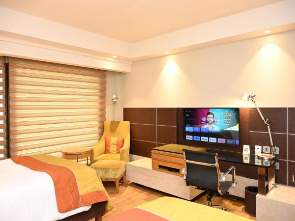 The LaLiT New Delhi : photo 4 de la chambre deluxe twin room - 10% discount on food & soft beverages, laundry & spa