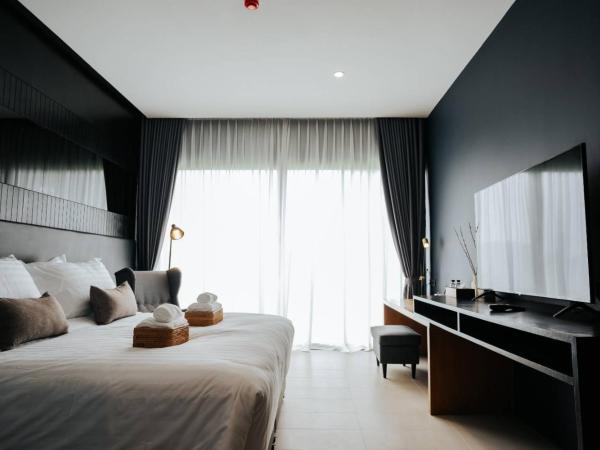 The Grandiose Hotel Chiang Rai เดอะแกรนด์ดิโอสเชียงราย : photo 4 de la chambre chambre lit king-size - vue sur jardin