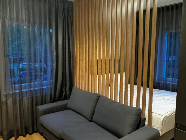 Garden Apartments : photo 2 de la chambre chambre lit king-size - vue sur jardin