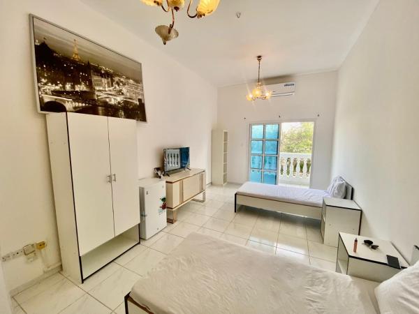 Comfortable Private Rooms in Compound Housing : photo 7 de la chambre chambre lits jumeaux