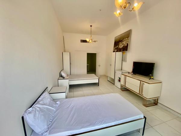 Comfortable Private Rooms in Compound Housing : photo 9 de la chambre chambre lits jumeaux