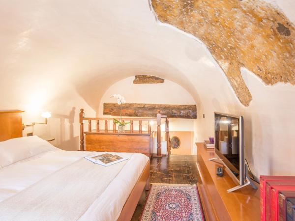 Corte Realdi Suites Piazza Erbe : photo 7 de la chambre appartement supérieur avec balcon en duplex - vue sur ville