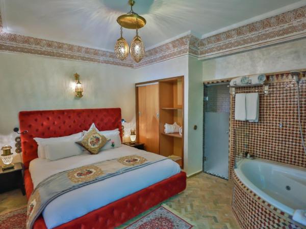 Palais Ommeyad Suites & Spa : photo 3 de la chambre suite senior avec bain à remous