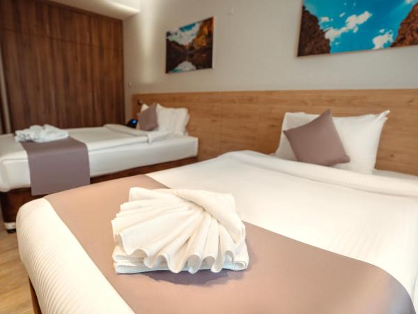 Kyriad Muscat : photo 3 de la chambre chambre lits jumeaux standard