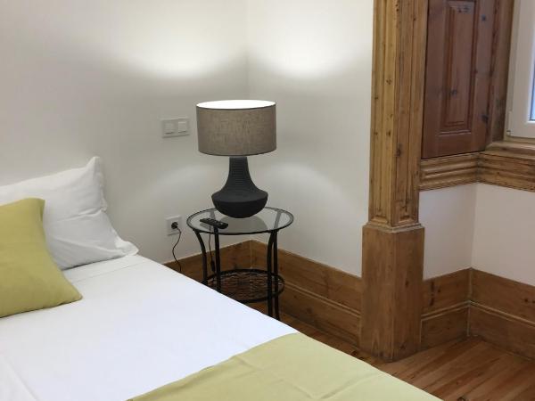 Casa da Praça Square Suites : photo 1 de la chambre chambre triple supérieure