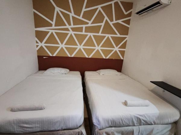 Maleeq Hotel @ Meru Ipoh : photo 3 de la chambre chambre lits jumeaux standard