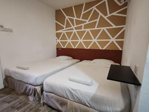Maleeq Hotel @ Meru Ipoh : photo 1 de la chambre chambre lits jumeaux standard