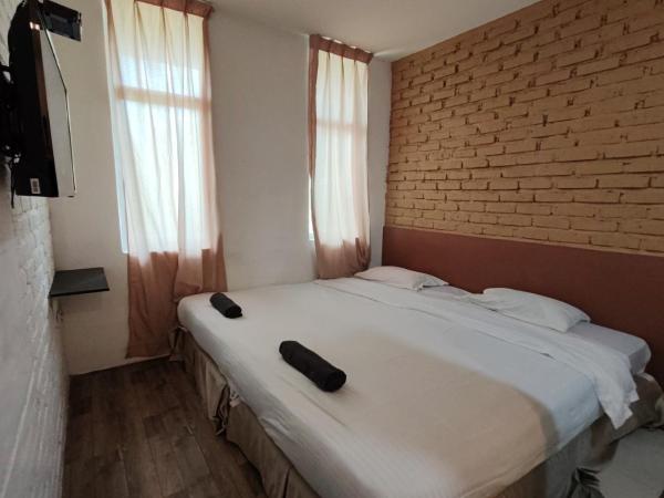 Maleeq Hotel @ Meru Ipoh : photo 1 de la chambre chambre lit king-size deluxe