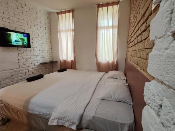 Maleeq Hotel @ Meru Ipoh : photo 3 de la chambre chambre lit king-size deluxe