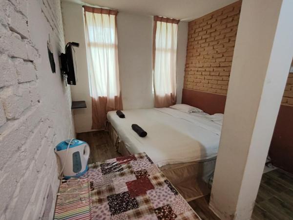 Maleeq Hotel @ Meru Ipoh : photo 2 de la chambre chambre lit king-size deluxe