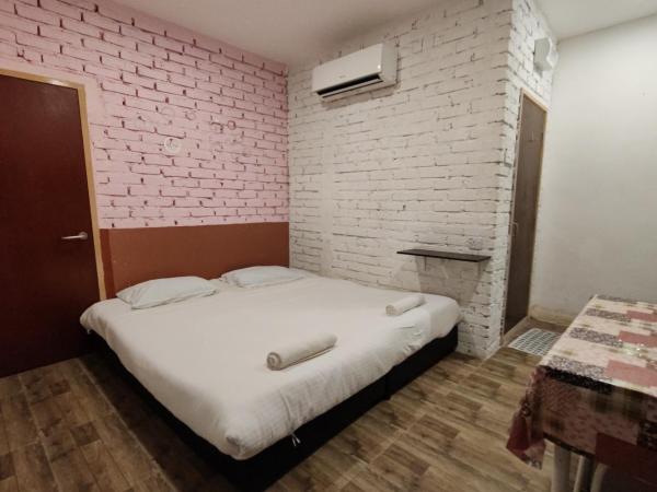 Maleeq Hotel @ Meru Ipoh : photo 1 de la chambre chambre lit king-size standard