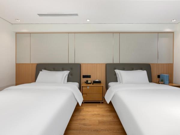 Waito Hotel Yuexiu Park Guangzhou : photo 4 de la chambre chambre lits jumeaux deluxe