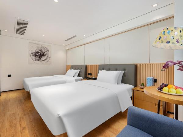 Waito Hotel Yuexiu Park Guangzhou : photo 5 de la chambre chambre lits jumeaux deluxe