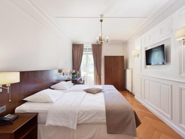 J5 Hotels Helvetie & La Brasserie : photo 4 de la chambre chambre double ou lits jumeaux