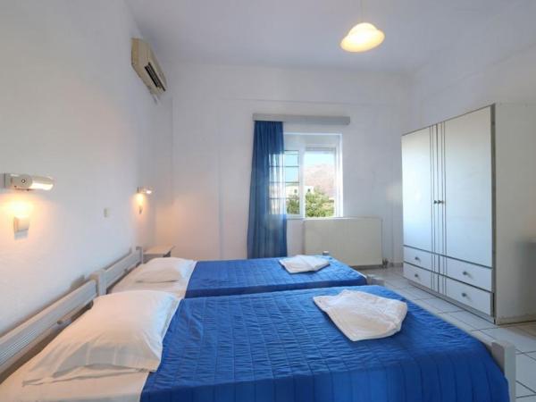 Villa Eleana : photo 4 de la chambre chambre quadruple - vue sur jardin