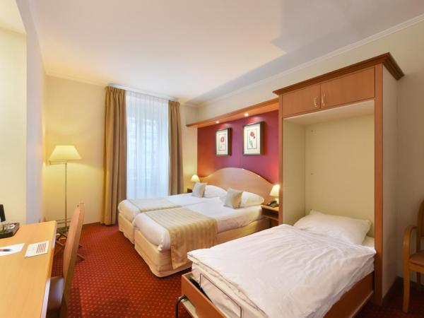 Hotel International & Terminus : photo 4 de la chambre chambre triple