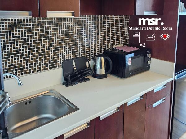 Kota Kinabalu City Ensuite by MSR at SCSP Ming Garden : photo 4 de la chambre chambre double standard